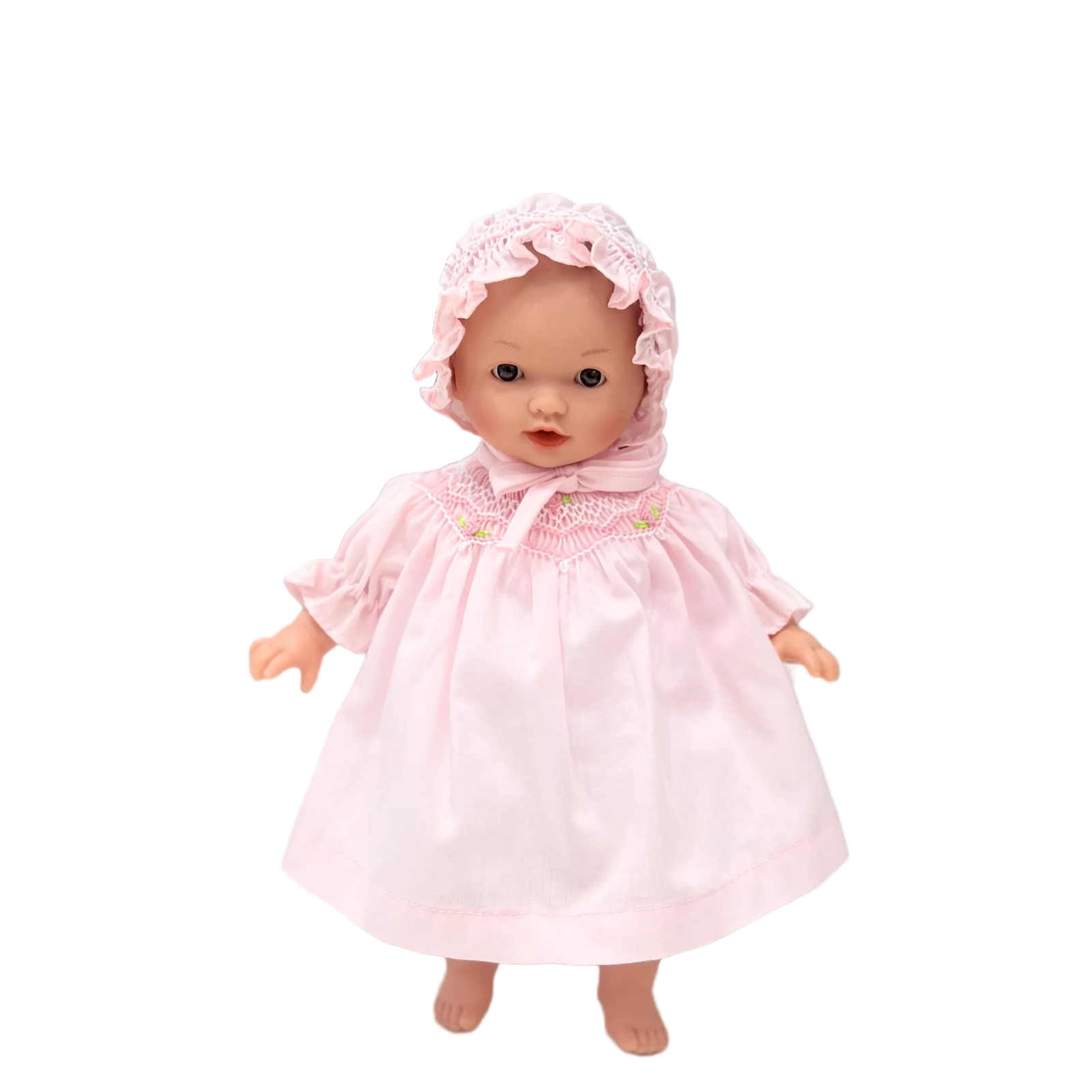 Baby doll in a pink outfit