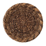 Tightly hand-woven rustic fibers create a rustically handsome charger that makes a quiet statement.